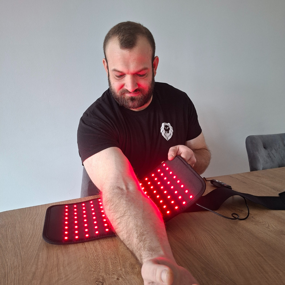 NEO LUMINUS Flex Pad glowing red while wrapped around an arm